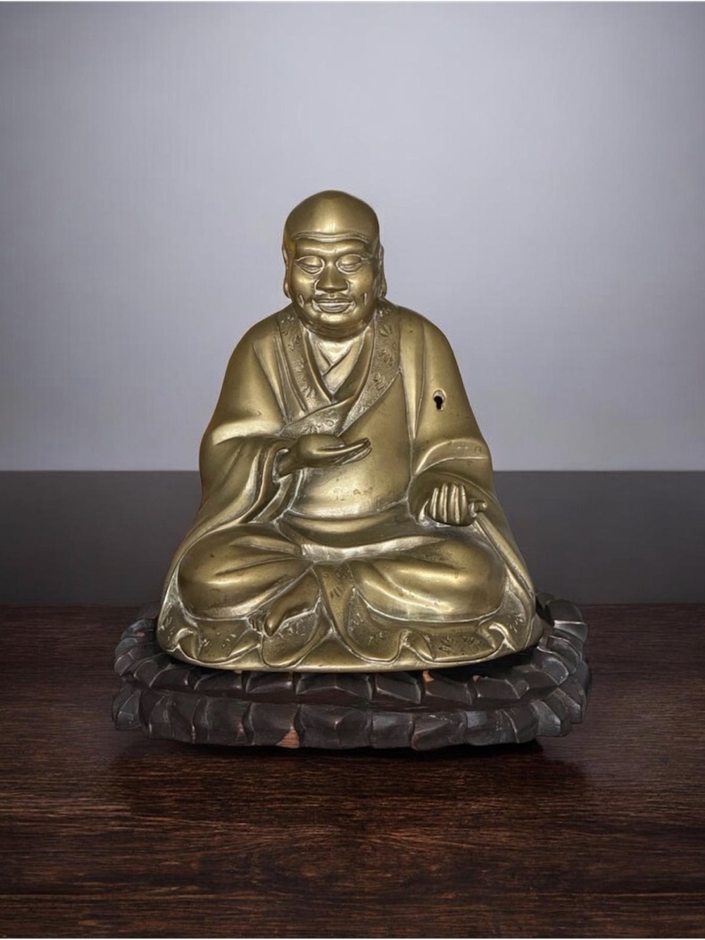 Late 19th Century Chinese Gold Fleck Cast
Bronze Figure of Buddha